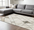 3' X 5' Beige Grey Tan And Brown Geometric Power Loom Stain Resistant Area Rug